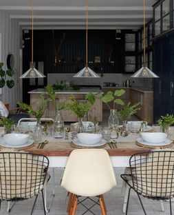 Clear Hay pendant lights over a kitchen table